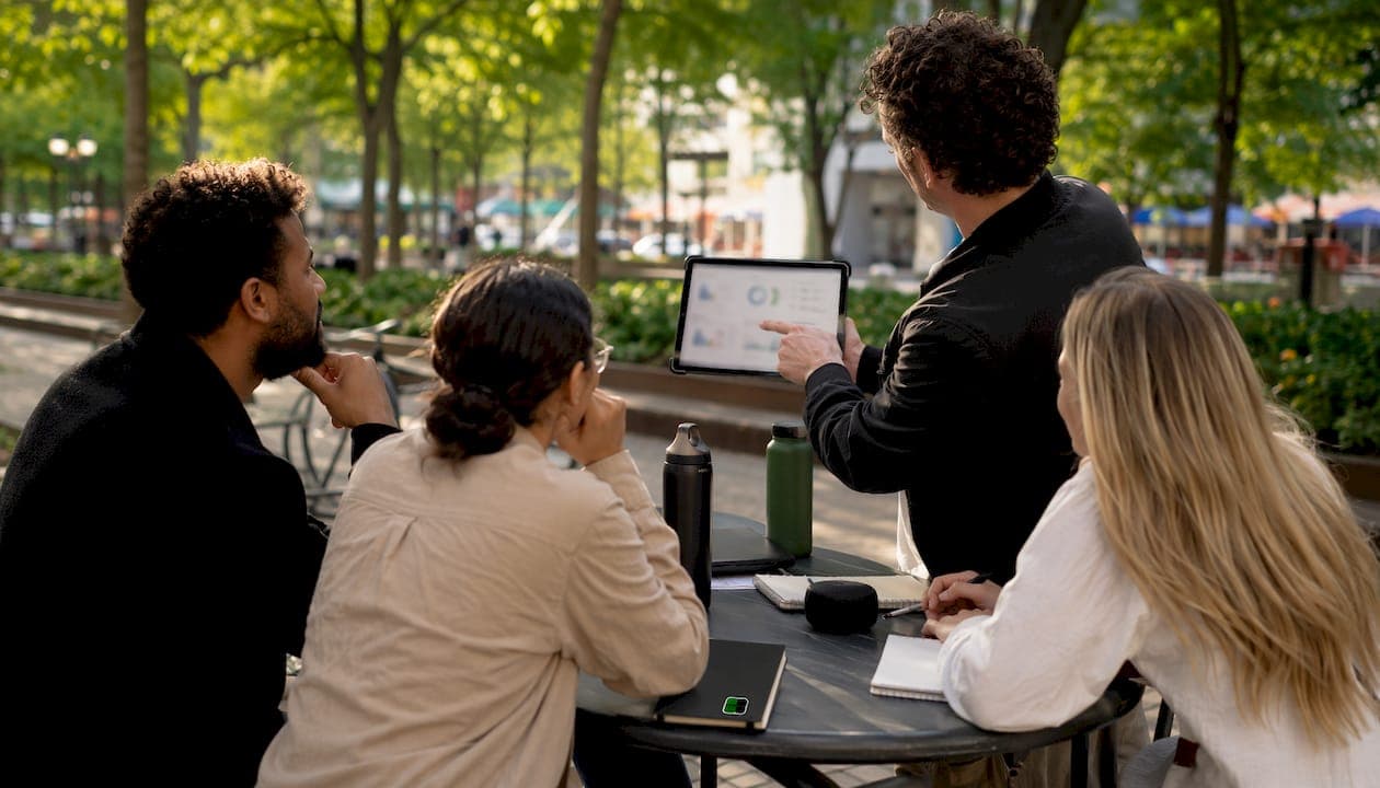 Team collaborating on LinkedIn scheduling software