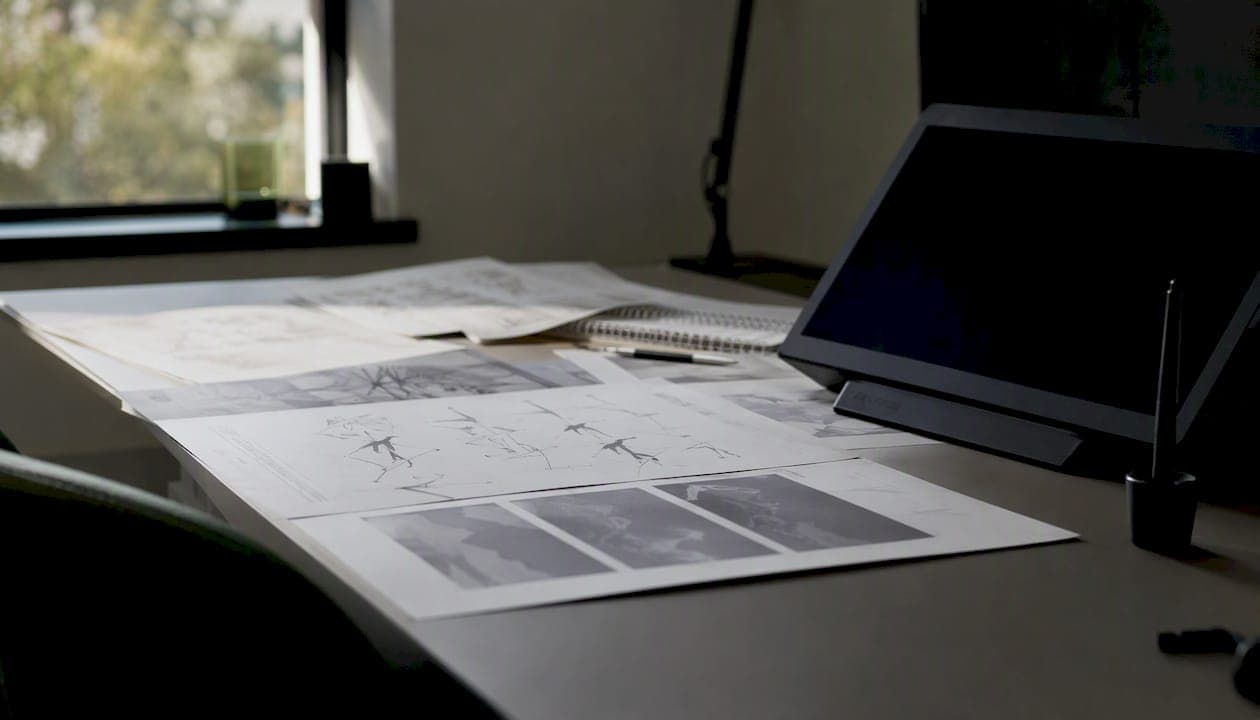 Desk with sketches and depth maps for AI motion generation